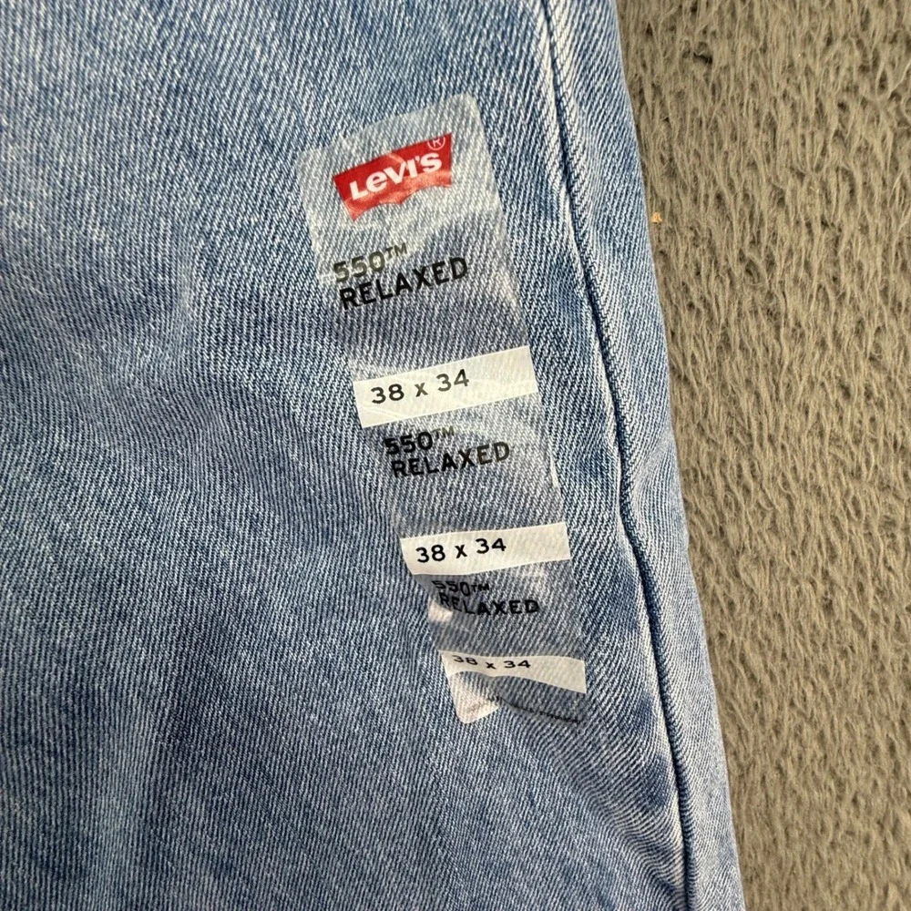 Levi's 550‎ Relaxed Fit Mens 38x34 Light Wash Blue Denim Jeans 100% Cotton